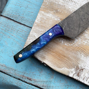 green and blue utility knife