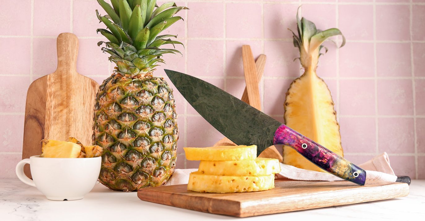 colourful utility knife cutting peinapple